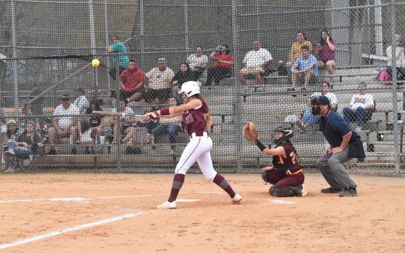 Haileigh Woodard is at the mound in a recent game.