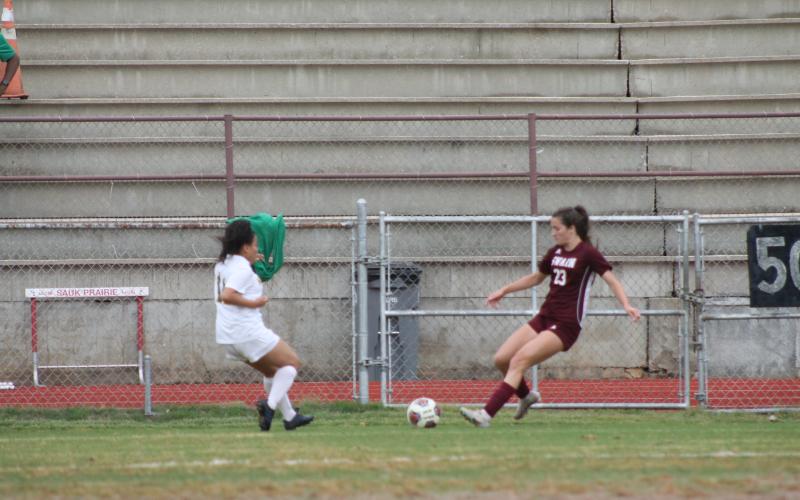 Lady Devil Cora Watkins faces off against an opposing team member at Monday’s game.