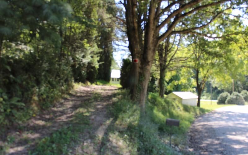 Jackie Thomason was killed at his residence on McCracken Road, pictured above, after Daniel Sutton and Jeremy Solomon went to his home to confront him about a truck title.