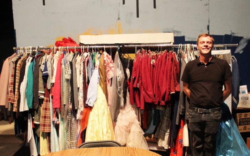 Ricky Sanford, president of the Community Theatre Association, looks at some of the costumes still needing to be assessed to see if they’ll ever be usable again after flooding damage a couple of years ago.