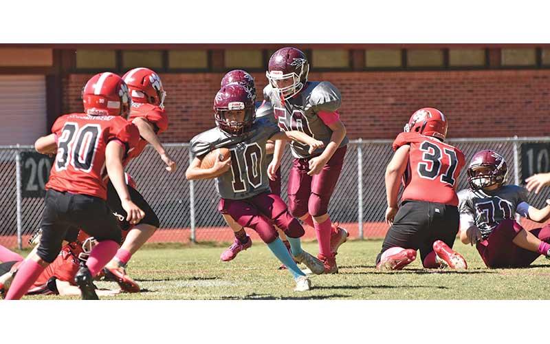 Joanna McMahan/Swain County Schools - Keyanthae Graham makes a run for it with the ball at the Oct. 6 away game against Hayesville. The Devils won the game 21-13.