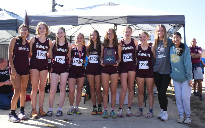 The Lady Devils cross country team came first place