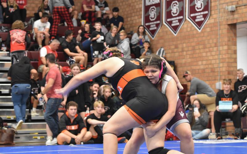 Swain wrestler Layla Alonzo grapples on the mat at the Maroon Devil Invitational, taking place Nov. 18.