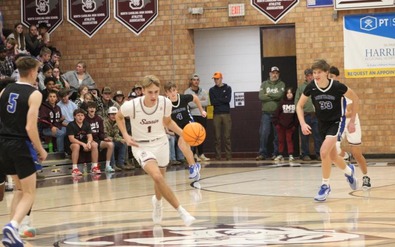 Larry Griffin lgriffin@thesmokymountaintimes.com  The Maroon Devils basketball team got off to a rousing start Tuesday night, Nov. 28, as they defeated the Smoky Mountain Mustangs in a close 64-58 game in which the scoring for both teams kept going until the final seconds. The team played strong, passing the ball in long formations with a quickness of the foot and throws made from all angles. The Mustangs were an even match as the teams fought hard over the ball, maneuvering, keeping tight hands as opponent