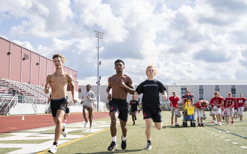 Kelan McCullough, far right, trains at Spire Academy. His goal is to be the best junior decathlon athlete in the country.
