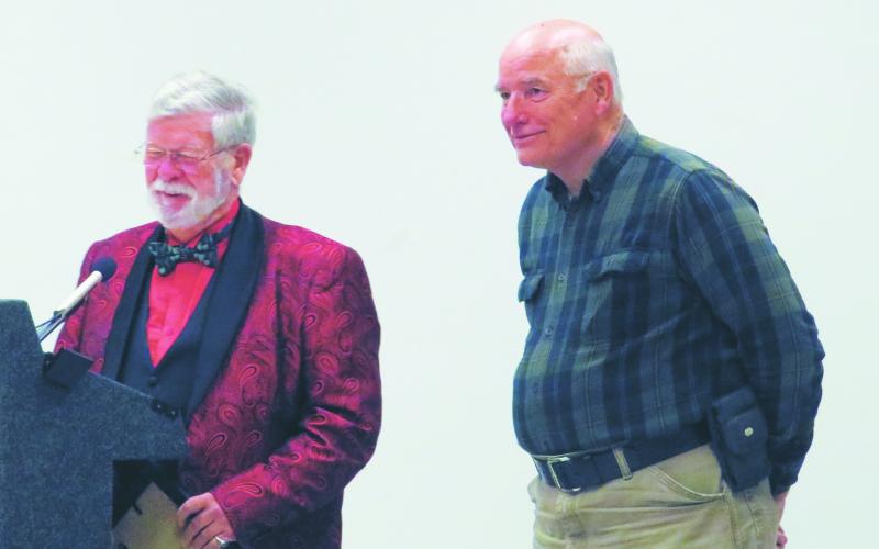 From left, Rep. Mike Clampitt presents Henry Chambers with the Certificate of Appreciation from Gov. Roy Cooper's Office.