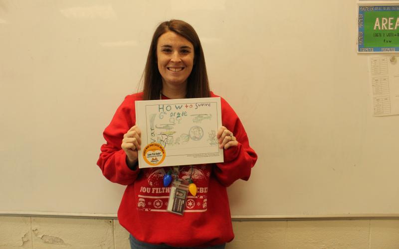 Sixth grade Exceptional Children’s teacher Emily McClung helped her class at Swain Middle School publish a book on “How to Survive the 6th Grade,” which features tips from the students for incoming new students to take to heart.