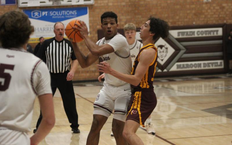 Maroon Devils senior Reese Winchester makes a run for it with the ball at the Friday, Jan. 5 game against Cherokee.