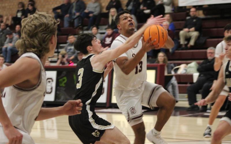 Senior Josiah Glaspie gets ready for a layup in the home win against the Yellow Jackets on Tuesday night.