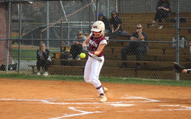 Sophomore Molleigh Woodard hits the ball at the home game against Hayesville on Monday, April 1.