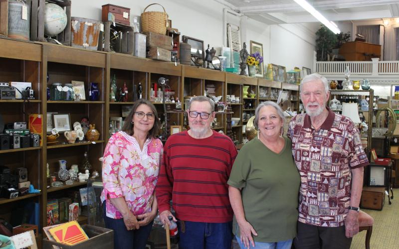 From left, Teresa Conner, Ivan Gibby, Terrie Stephens and Frank Calhoun are pictured inside Calby’s, an antique store downtown. Conner and Stephens have recently partnered with Gibby and Calhoun to lease the business for a year.
