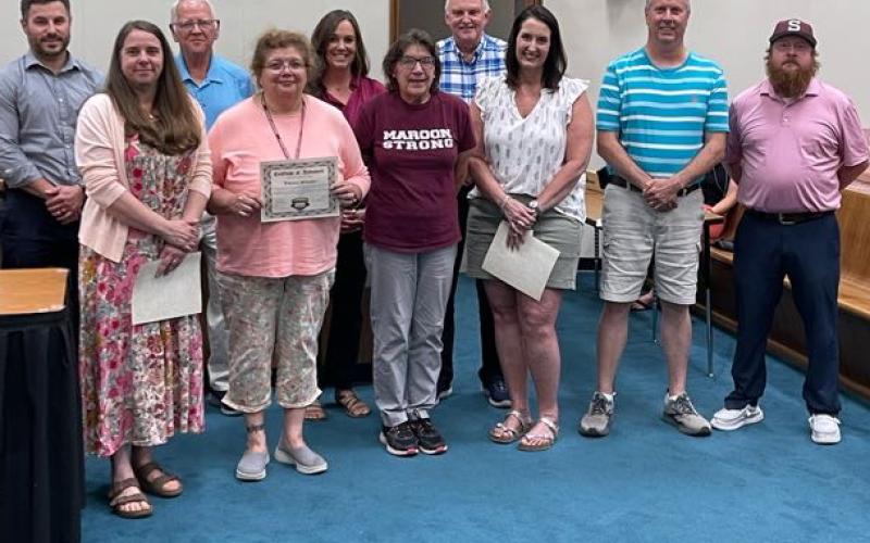 Swain County Board of Education recognized the following retirees (pictured with school board members) during the meeting Monday: Cindy Arch, Judy Cloninger, Pam Cunningham, Nira Franklin, Janie Lambert, Ginger Myers, Kristie Reynolds, William Reynolds and Trina Stiles.
