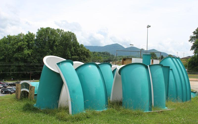 The pieces of the fiberglass slide that will be installed next to the county pool are pictured.