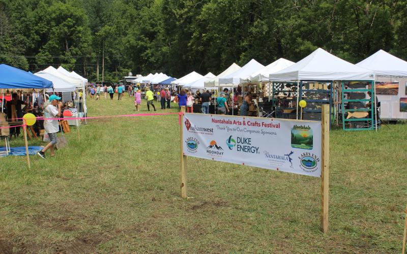 The festival sign welcomes visitors to the first Nantahala Arts and Crafts Festival held this past Saturday.