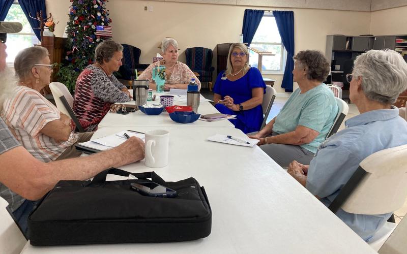 Tammy Williams and Ginger Frady with United Community Bank in Bryson City, speak at Swain Senior Center conducting a program on senior fraud
