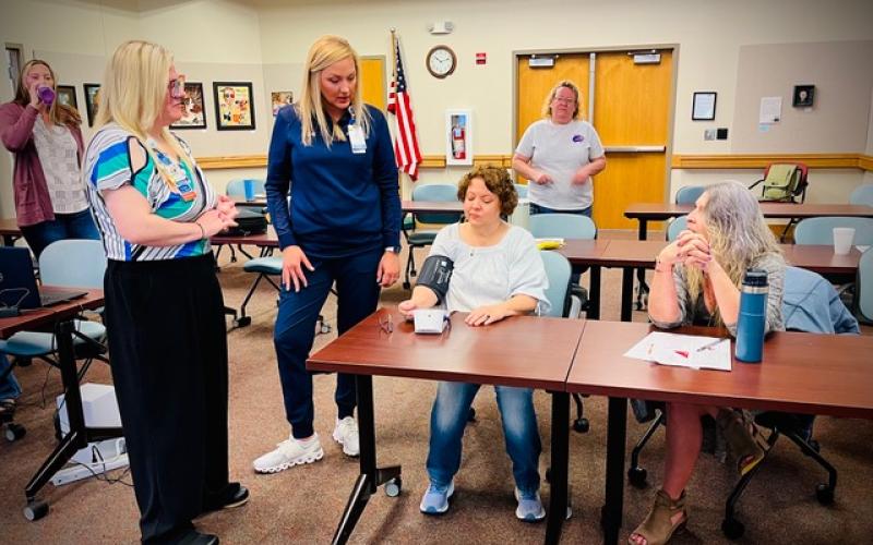 Amanda Pack and Cara Smith of Angel Medical Center trained Fontana Regional Library staff to help patrons to check out and use Libraries with Heart blood pressure monitoring kits.