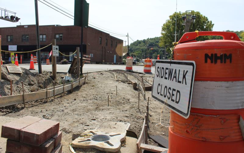 The sidewalk in front of the depot is closed