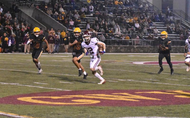 Maroon Devil Corey Stillwell on the carry early in the game against the Braves.