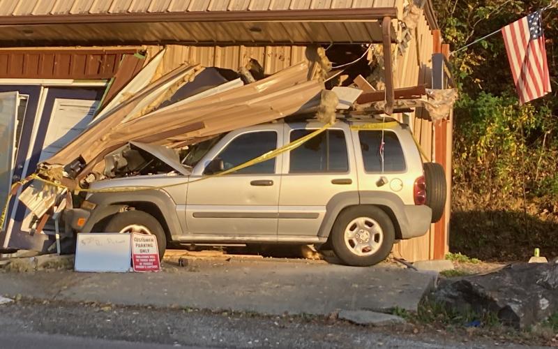 A woman has been charged with driving while impaired after crashing a vehicle into Ridgeline Mechanical on Main Street in Bryson City.