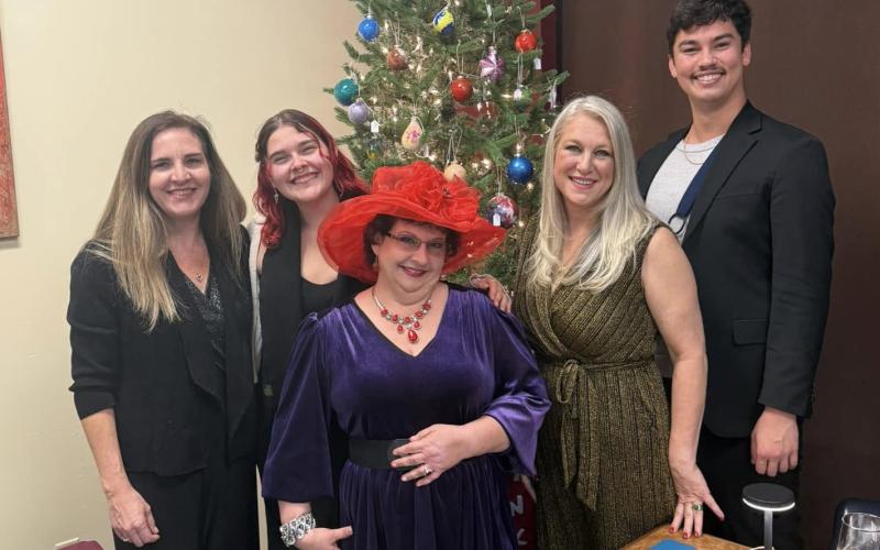 Restoration House staff are pictured at a recent fundraiser. From left is Erin Pooser, Ella Pinder, Tammy Davis, Carlyn Chasse and Parker Chathum.