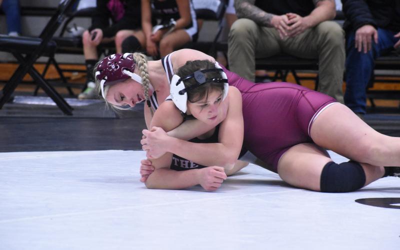 Lady Devil Elaynah Cogdill has a good hold on her competitor.