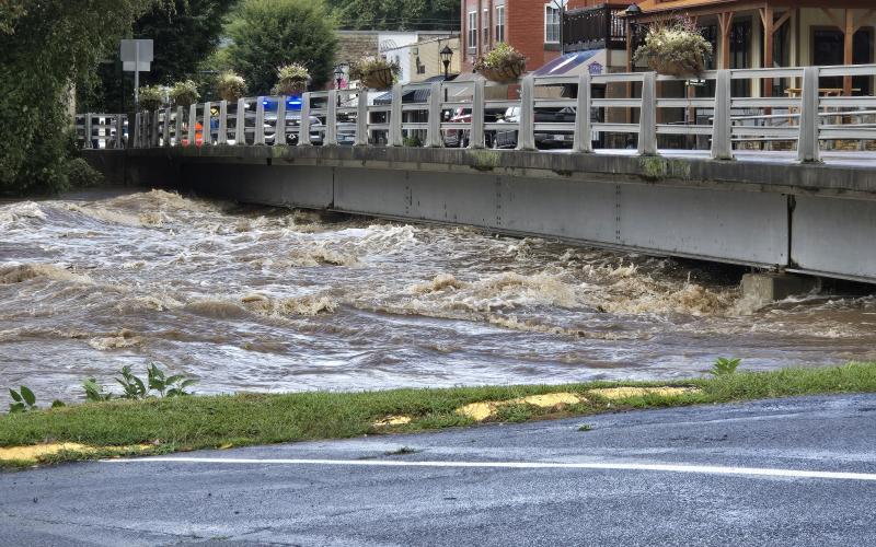 Pictured is Everett Street bridge and the raging waters of the Tuckasegee River during Hurricane Helene.