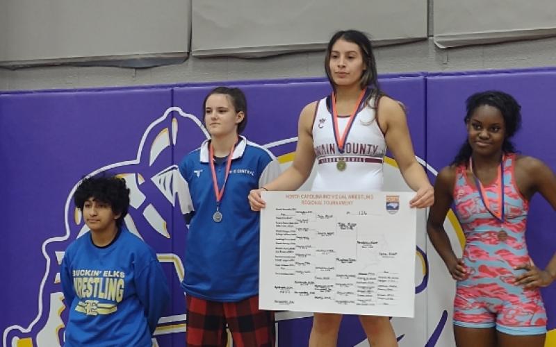 Lady Devil senior Tasia Neadeau is the Regional Champion in the 126-pound class.