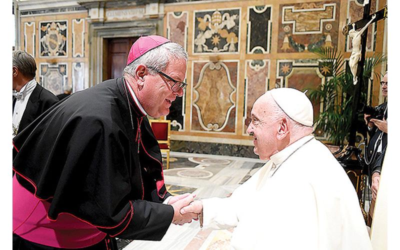 Catholic Diocese of Charlotte Bishop Michael Martin, OFM Conv., greets Pope Francis among 300 other newly ordained bishops in Rome last September. Pope Francis, 88, died Monday.