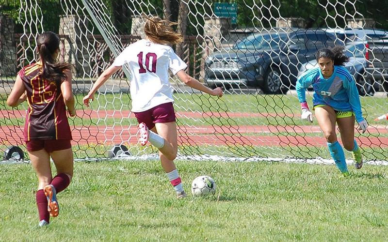 Photo/Brittany Blankenship.  Mya Burrows-Kurr scores her 100th career goal at Cherokee Monday, April 28. It took less than 60 seconds for the Lady Devils to get on the scoreboard with Burrows-Kurr’s first of six goals in the match.