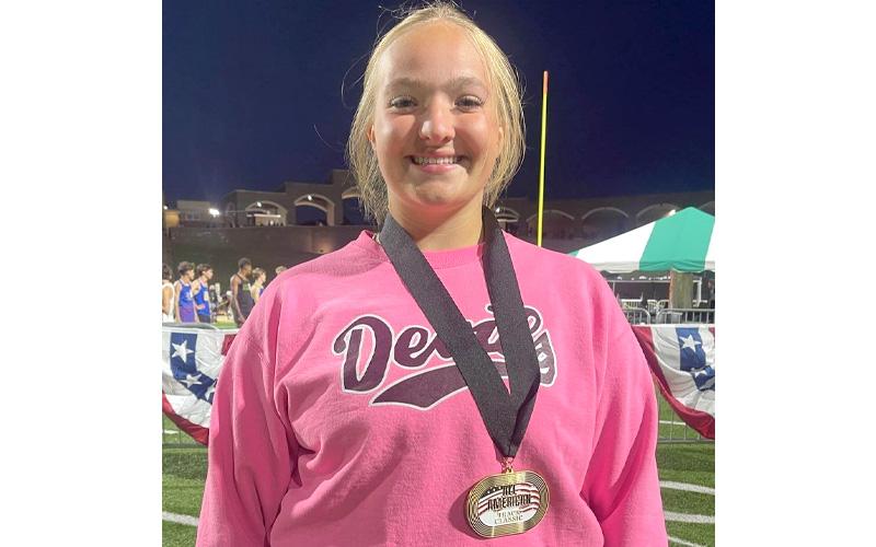 Faith Woodard earns first place in shot put in the Blue Ridge Classic at A.C. Reynolds High School April 4. Woodard placed fifth in shot put with a throw of 39’2” at the All-American Track Classic in Columbia, S.C. the following weekend.