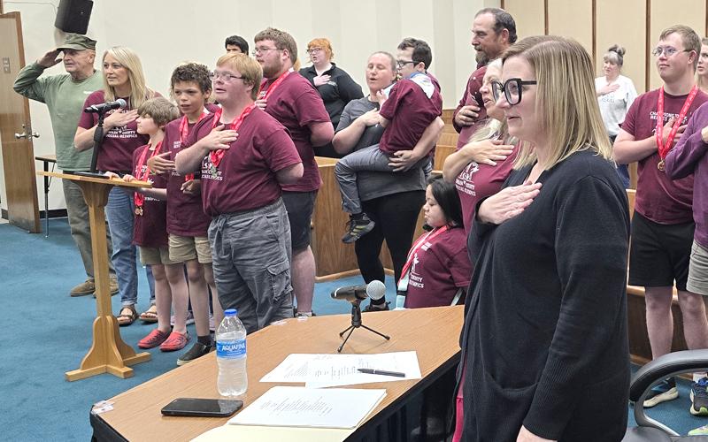 SMT photo/Sara Eisinger.  Nolan Griggs leads the Pledge of Allegiance.