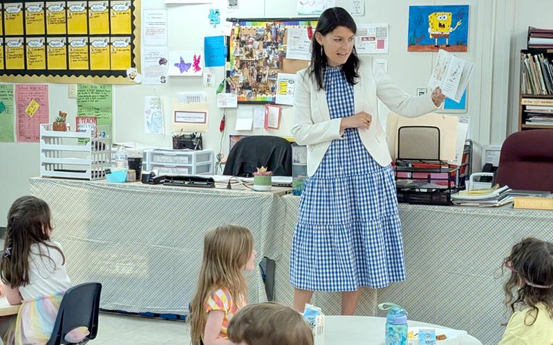 Submitted photo.  Dr. Elena Ashburn, senior education advisor for education policy to Gov. Stein, reads to West Swain Elementary students Monday, May 19. Dr. Ashburn’s visit was prompted by an invitation from Governor’s Teacher Advisory Committee member Lydia Sale, Regional Teacher of the Year.
