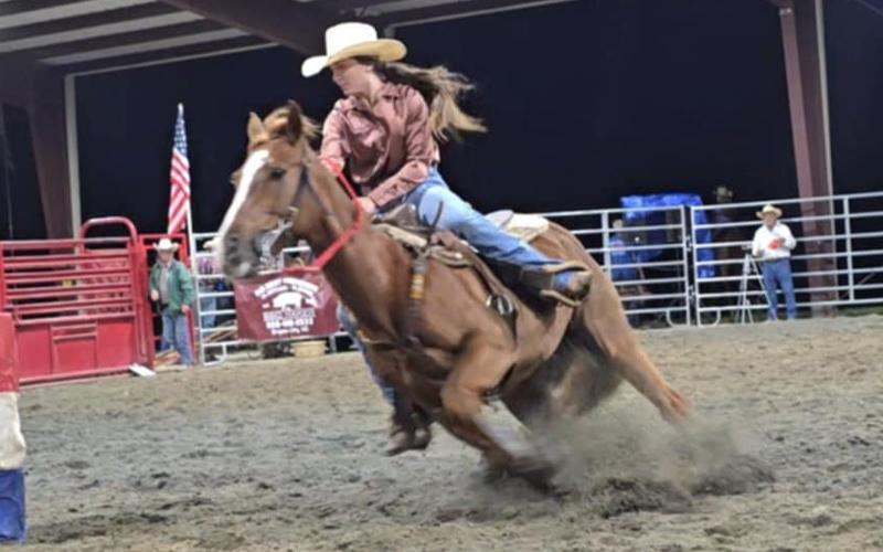 SMT photo/Sara Eisinger.  Emma Beasley of Robbinsville rides with the Ernie Treadway Rodeo at Great Smoky Mountain Event Park May 3-4.