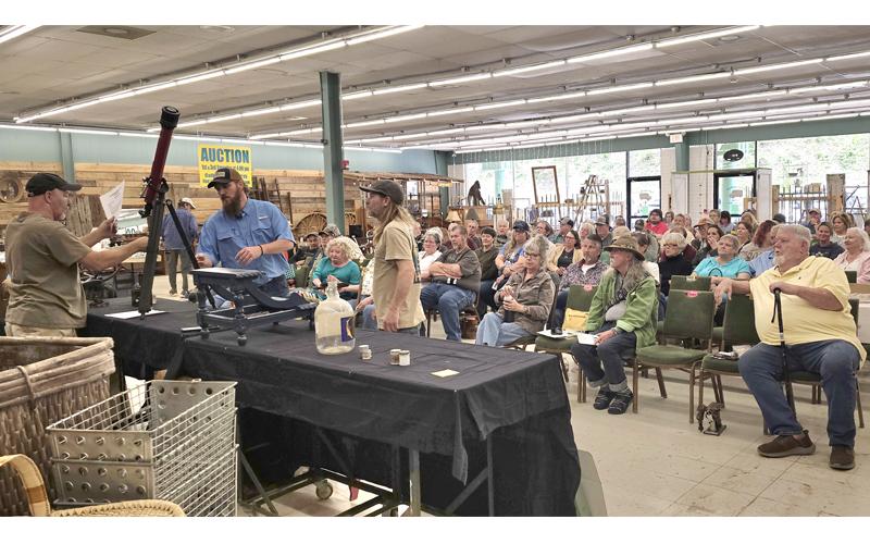 SMT photos/Sara Eisinger. Buttermilk Farms Antiques &amp; Auction seats nearly 200 people during its monthly auction Saturday, May 24. Meanwhile, Susan Leading Fox, owner, ran a successful cake auction fundraiser to thank fire crews.