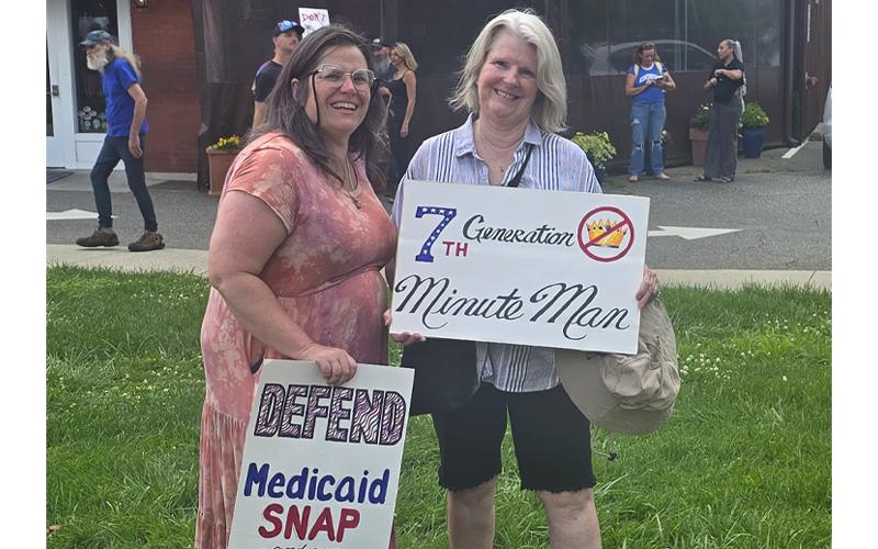 Sunny Faulhaber protests next to her mother, Catherine D’Angelo, a Kent State University shooting survivor, during the “No Kings” demonstration in Bryson City June 14. Faulhaber said her mom has always encouraged her to stand up for what she believes in.