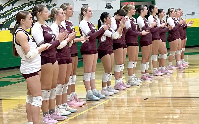 Submitted photo.    Left: Team prepares for start of their Aug. 19 match against the Bobcats.