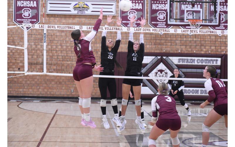 Submitted photo.  Senior Kennedy Anthony (left), goes up for an attack against Robbinsville’s double block last Thursday, Sept. 4, in their 3-0 win.