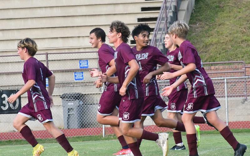 Submitted photo. The team celebrates a goal as Yuriel De La Cruz #11 scored a PK against Blue Ridge.