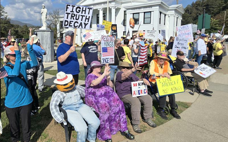 SMT photo/Sara Eisinger.  Approximately 250 participants lined the sidewalks of Everett and Main Streets at the No Kings rally on Oct. 18.