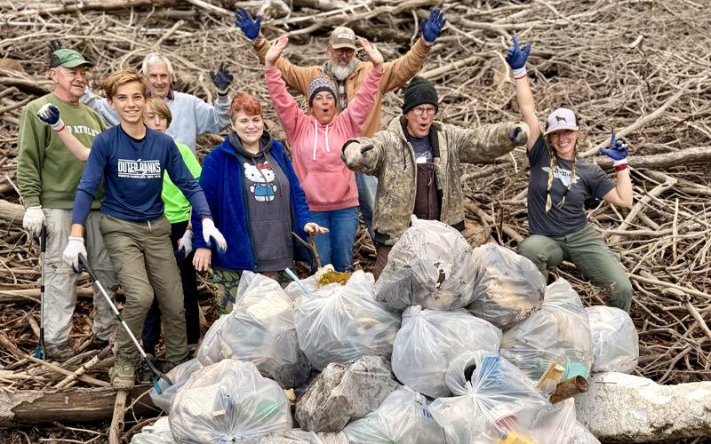 Photo/Sarah Jones.  Volunteers clean approximately 60,000 pounds of garbage from this year’s Fontana Lakeshore Trash Cleanup, hosted by Brandon Jones, Nov. 2.