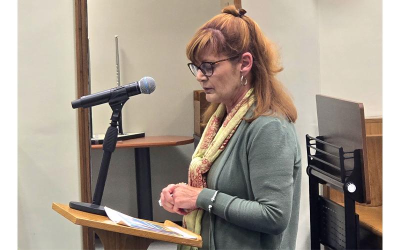 Photo/Sara Eisinger.  Shelly Foreman, community relations regional director at Vaya Health, provides a brief update at a Swain County Commissioners meeting Nov. 18.