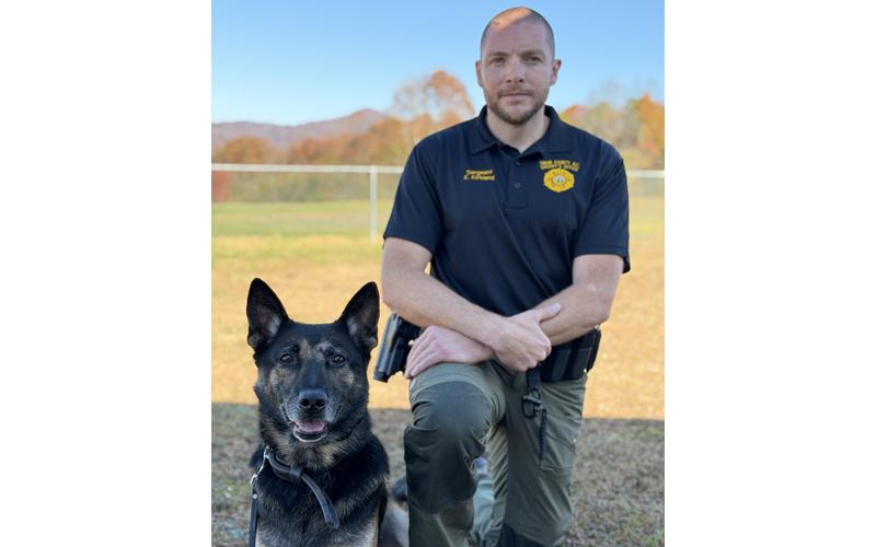 Swain County Sheriff’s Office K-9 Sgt. Eli Kirkland with his detection dog, Toro, a five-year-old male German shepherd and Belgium mix in summer 2025. (Submitted photo)