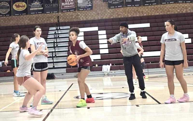 SMT photo/Sara Eisinger. Swain Maroon Devils embrace “we” over “me” thinking during practice Nov. 21.