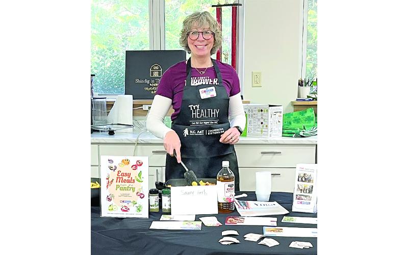Submitted photo.  Shannon Royce, extension agent-family and consumer sciences for NC Cooperative Extension in Swain and Jackson counties, cooks Easy Meals from the Pantry at Southwestern Community College in January.