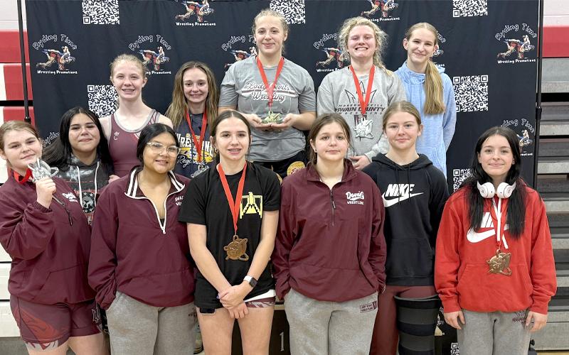 Photo submitted.  Varsity competitors Izabella Ponton (left to right), Alexis Tranter, Melyssa Wildcat, Madison Mashburn, Asiah Ball, Mattie Brown, Chloe Kent (Back) Claire Ball, Elaynah Cogdill, Makayla Hunt, Lindsey Faulkenberry and Elliana Norton at Hendersonville Jan. 3.