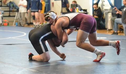 Cody Long competes at the Enka Duals.
