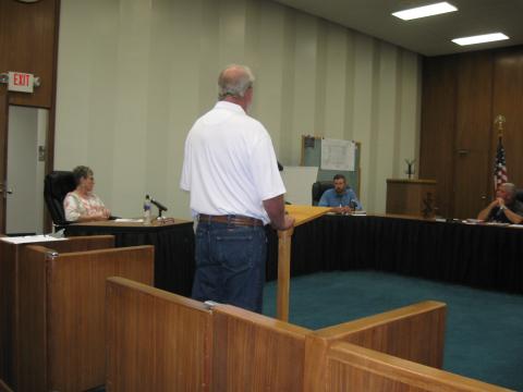 Mark Day speaks before the town board