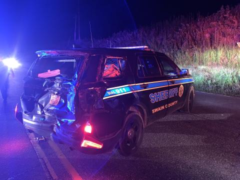 An alleged drunk driver crashed into the back of a Swain County Sheriff's Deputy vehicle 