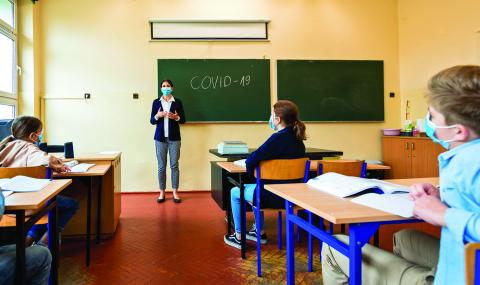 Students and teachers will wear masks and social distance