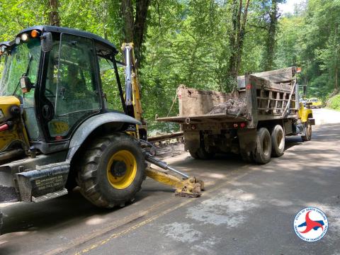 A mudslide is cleared